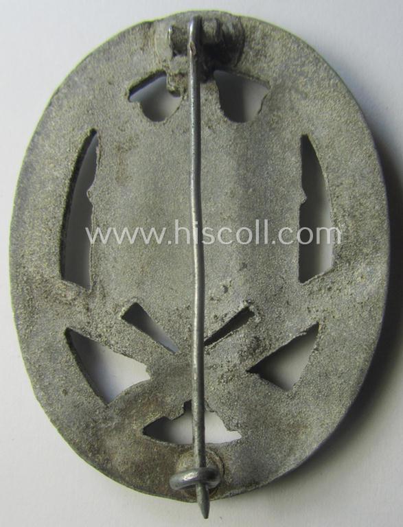 'Allgemeines Sturmabzeichen' (or: General Assault Badge ie. GAB) being a typical unmarked, zinc-based- (ie. 'Feinzink'-) and/or: 'semi-hollow-back'-version as was (I deem) produced by the: 'Rudolf Karneth'-company