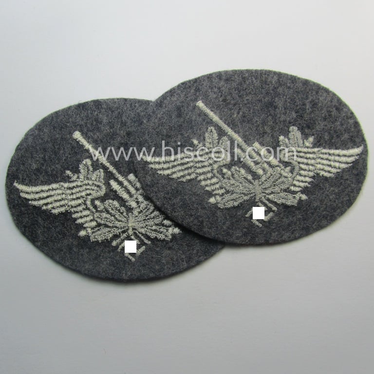 Machine-embroidered WH (Luftwaffe) trade- ie. special-career-patch as was intended for: 'Flak-Artillerie'-staffmembers and that comes in a probably issued but never worn- (ie. 'virtually mint'-), condition