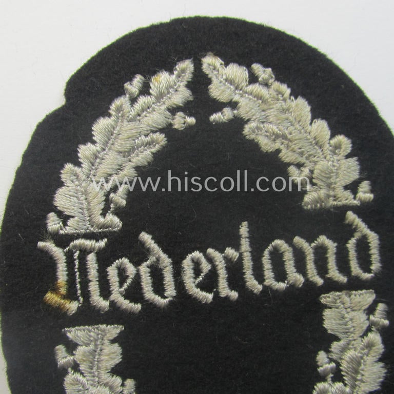 Superb - and exceedingly rarely found! - example of a Dutch SS-related so-called: 'Werkdienst Nederland'-arm-patch
