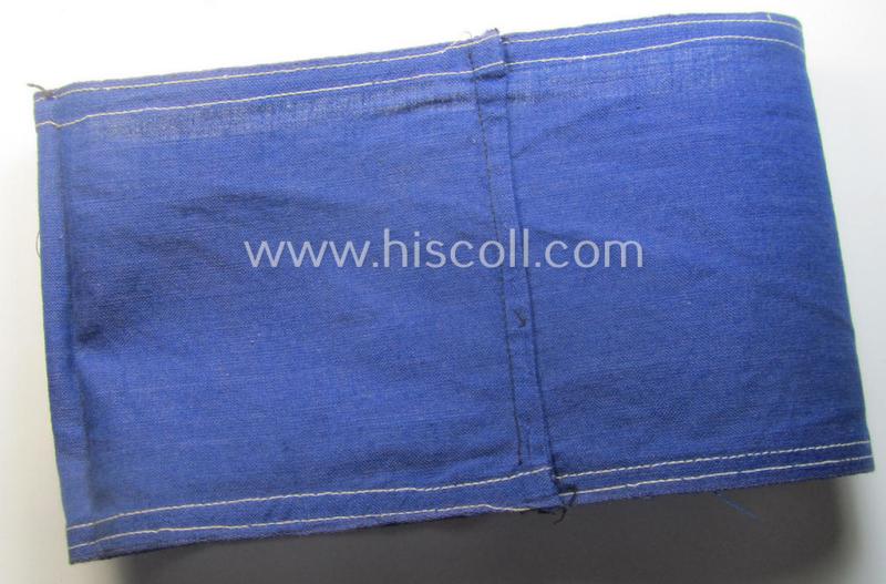 Darker-blue-coloured, RLB (or: 'Reichsluftschutzbund') so-called: 'Amtsträger-Armbinde für Führer' depicting the typical 'RLB'-logo (with lettering) and that comes in a moderately used- ie. worn, condition
