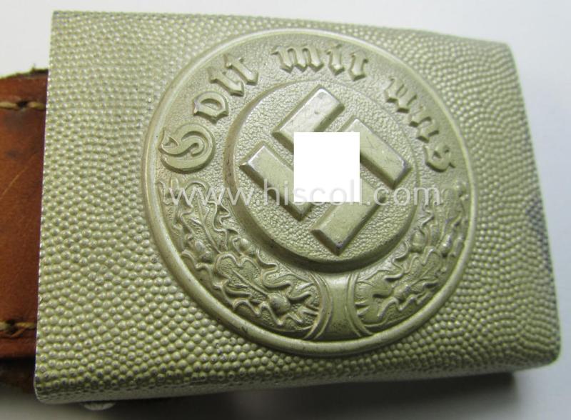 Superb, police (ie. 'Polizei') aluminium-based belt-buckle (ie. 'Koppelschloss für Mannschaften u. Uffz. der Polizei') being a maker- (ie. 'Dransfeld & Co.'-) marked and '1940'-dated example that comes in a fully untouched, condition