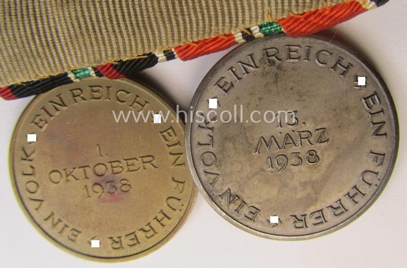 Two-pieced, WH (Heeres o. Kriegsmarine) medal-bar (ie.: 'Doppelspange') showing resp. an Austrian and Czech 'Anschluss'-medal (which latter comes with a firmly attached 'Prager Burg-Spange')