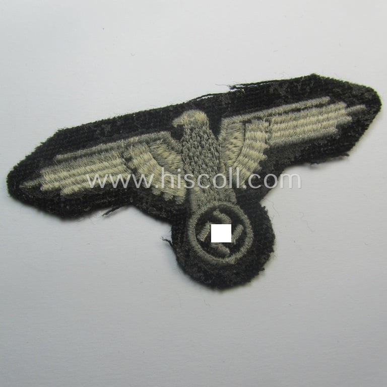 Mid- (ie. later-war-) pattern, 'SS' (ie. 'Waffen-SS') so-called: 'RzM-style' enlisted-mens'-/ie. NCO-pattern arm-eagle as was intended for usage by the various Waffen-SS troops throughout the war