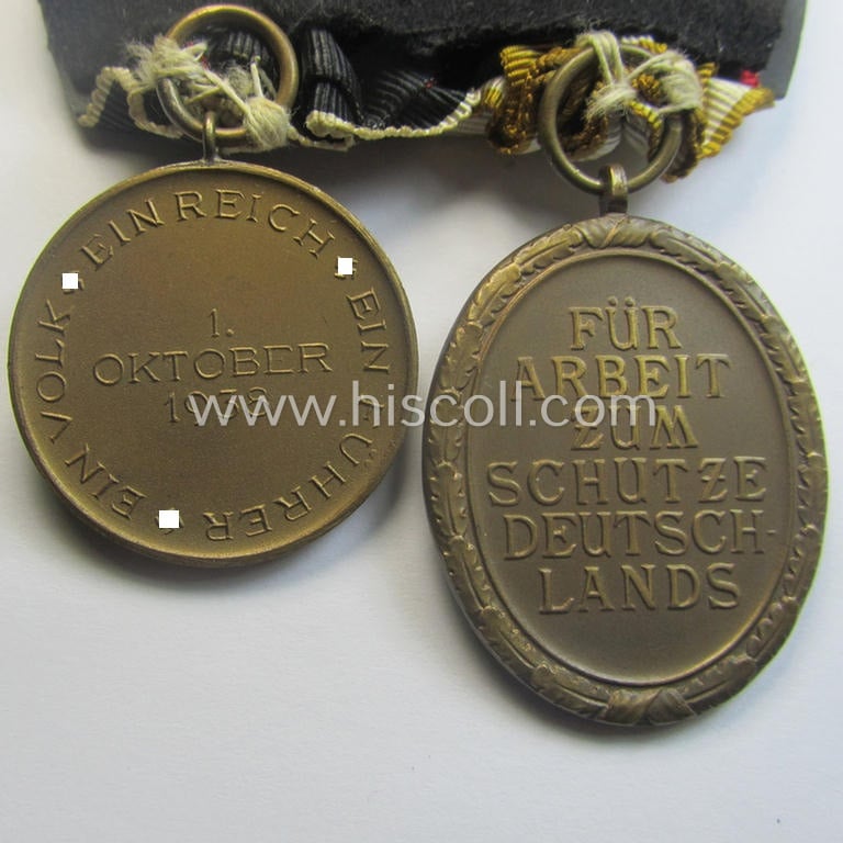 WH (Heeres, LW etc.) medal-bar (ie.: 'Doppelspange') resp. showing a: 'Westwall'-medal and a Czech 'Anschluss'-medal: '1 Oktober 1938'