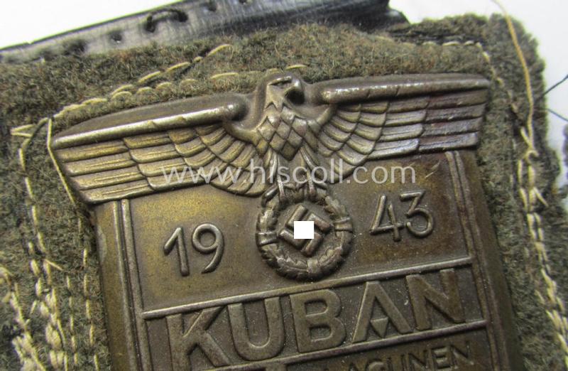 Attractive - truly worn and actually scarcely encountered! - WH (Heeres ie. Waffen-SS) 'Kuban'-campaign-shield that comes mounted onto its original field-grey-coloured- and/or woolen-based 'backing' as issued and/or used
