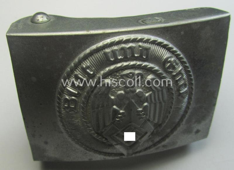 HJ ('Hitlerjugend'), zinc-based belt-buckle being a 'virtually mint' and/or non-maker-marked example having a seldomly seen 'cranked-catch'-set-up and that comes with its period 'RzM'-etiket still attached
