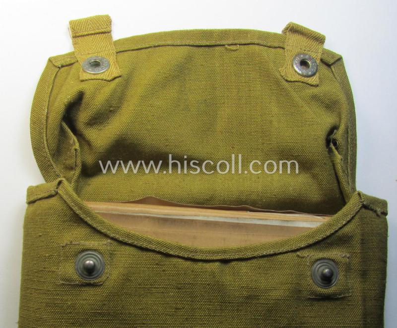 Superb, mustard-yellow-coloured- and/or linnen-based WH (LW ie. Heeres) so-called: gas-cape-pouch (or: 'Tasche für Gasplane') that comes complete with its rarely found, rubberised- (and neatly '82'-marked), contents