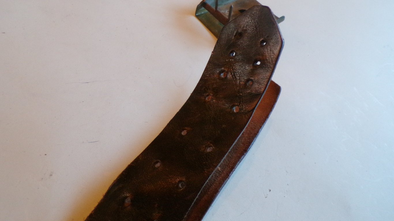 S.A brown leather belt and buckle