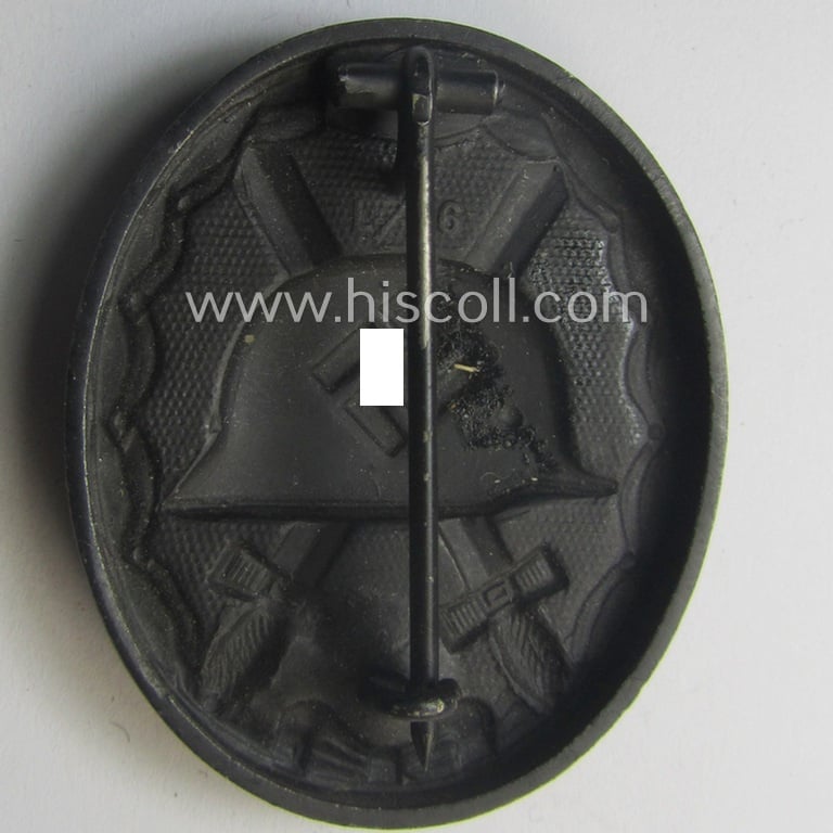 Neatly maker- (ie. 'L/56'-) marked example of a black-class wound-badge (or: 'Verwundeten-Abzeichen in Schwarz') being an example that was produced by the maker (ie. 'Hersteller') named: 'Funcke & Brüninghaus'