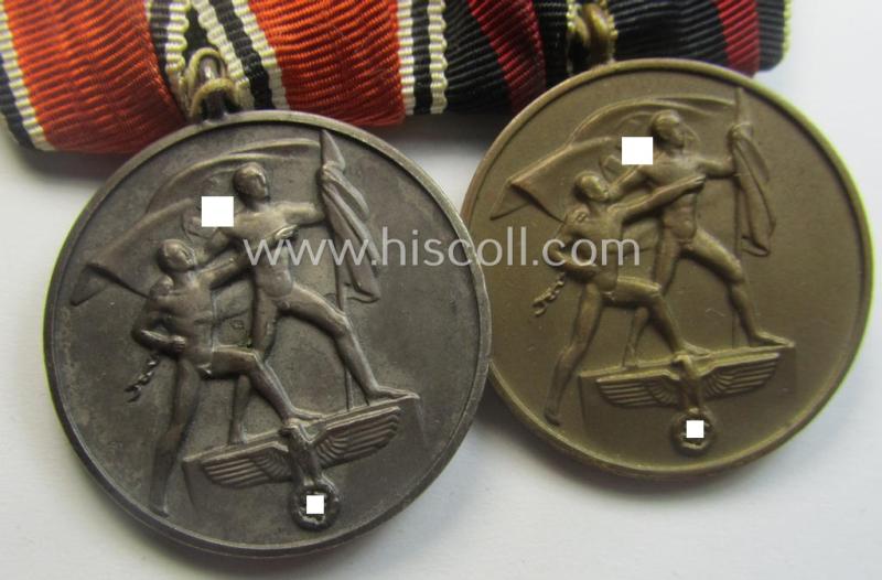 Two-pieced, WH (Heeres o. Kriegsmarine) medal-bar (ie.: 'Doppelspange') showing resp. an Austrian and Czech 'Anschluss'-medal (which latter comes with a firmly attached 'Prager Burg-Spange')