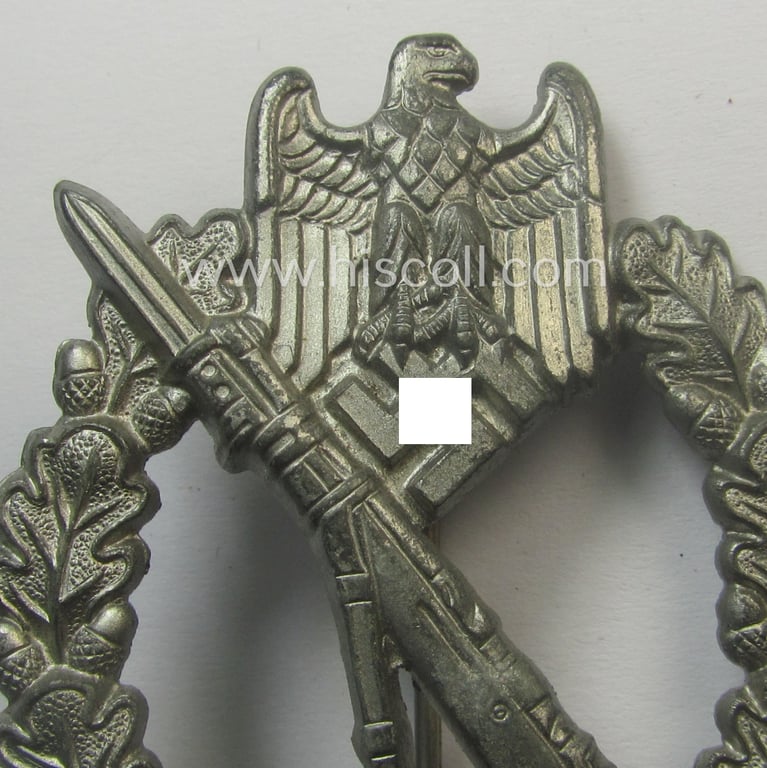 Hardly worn, 'Infanterie Sturmabzeichen in Silber' being a non-maker-marked and/or typical zinc- (ie. 'Feinzink'-) based version (ie. 'crimped scooped rifle-variant') as was (I deem) procuded by the: 'S&L'- (ie. 'Steinhauer u. Lück'-) company