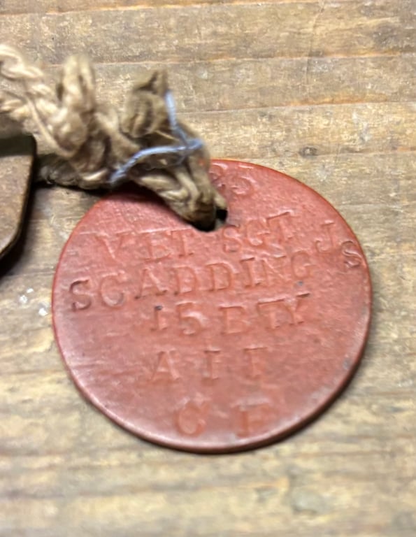 Australian Imperial Force Identity Discs to 125 Veterinary Sergeant JS Scadding 15th Battery AIF