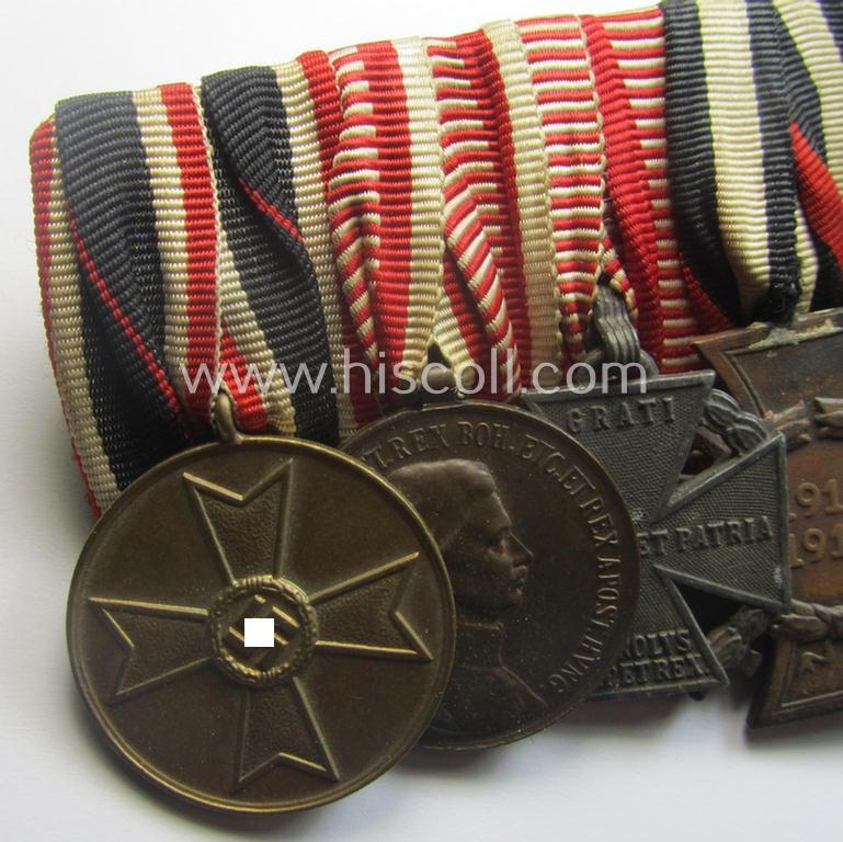 Unusually seen, 8-pieced WWI- (ie. TR- ie. N.S.D.A.P.-) related 'Ordenspange' showing amongst others: an 'N.S.D.A.P-D.A. in Bronze' (ie. '3. Stf. für 10 Jahre t.D.') and various WWI-period Austrian-(Hungarian) awards