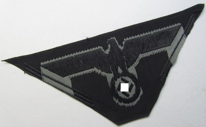 Later-war-period, WH (Heeres) ie. 'Panzer'-related-, so-called: 'M44'-pattern, trapezoid-shaped breasteagle, being a bluish-grey-coloured example as executed in neat 'BeVo'-weave pattern on a black-coloured background