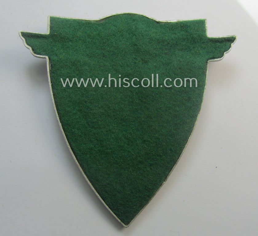 Superb - quite rarely seen and very detailed! - aluminium-based, N.S.K.K.-related armshield (ie. 'Ärmelshield') depicting the typical N.S.K.K.-eagle-device and text that reads: 'Verkehrserziehungsdienst'