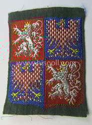 Colourful and neatly 'BeVo'-woven armshield as was specifically...