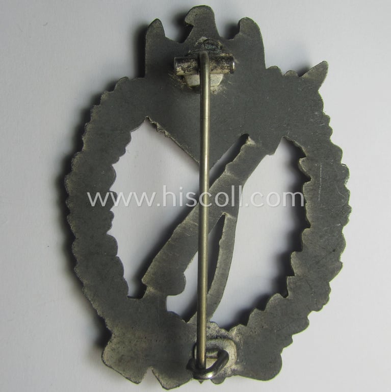 'Infanterie Sturmabzeichen in Silber' being an unmarked, 'variant'-pattern-example as executed in zinc-based, silverish-toned metal (ie. 'Feinzink') as was (presumably) produced by: 'Deschler & Sohn - München'