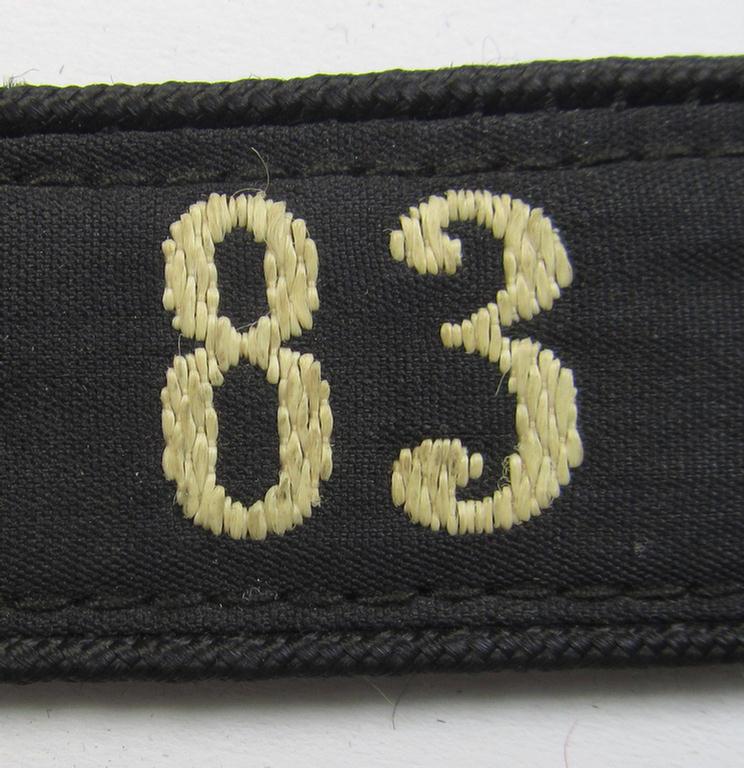 Neat - and naturally single! - black-piped, so-called: 'DJ- o. Deutsches Jungvolk' shoulderstrap as was intended for usage by a: 'DJ-Mitglied' who served within the: 'Bann 83' (83 = 'Kassel')
