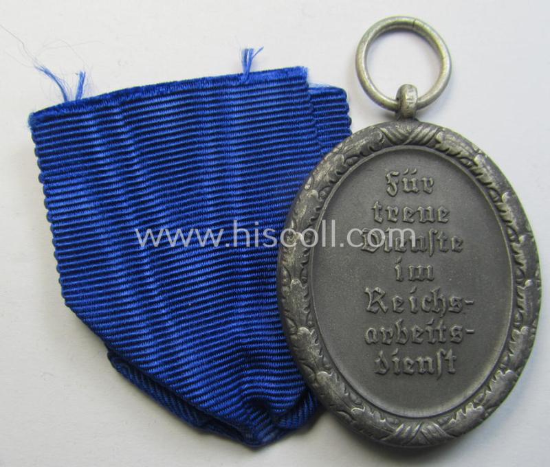 Attractive example of a: 'Reichsarbeitsdienst der weiblichen Jugend' (or: RADwJ) so-called: 'Dienstauszeichnung 3. Stf. in Silber' that comes mounted onto its period (broad-sized) ribbon (ie. 'Bandabschnitt')