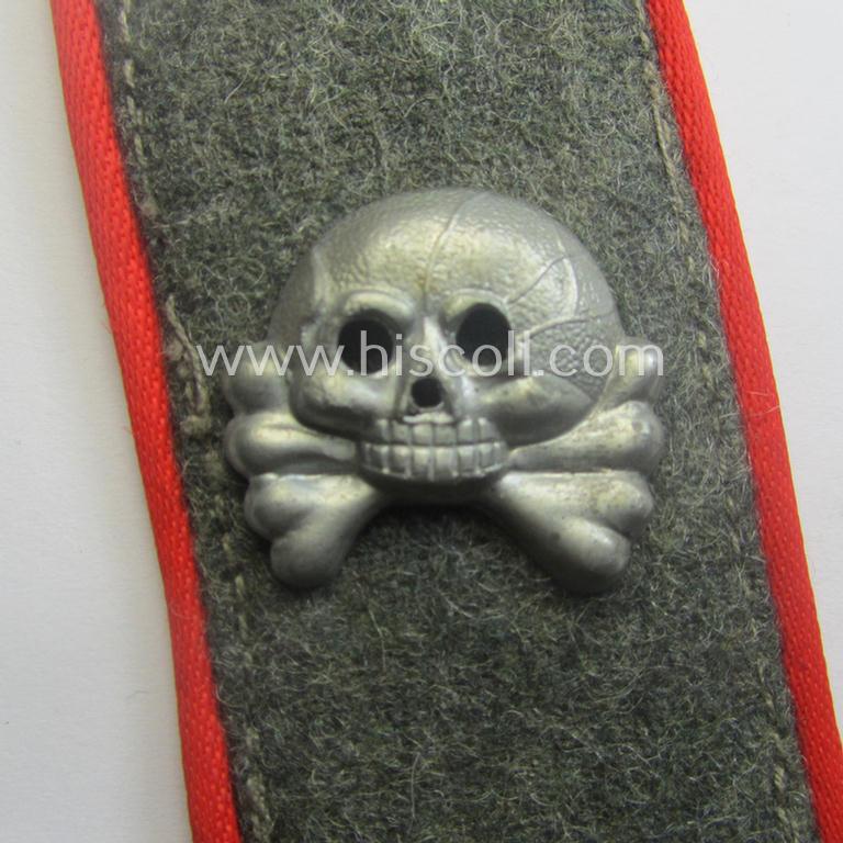 Single, mid- (ie. later-war-) period, WH (Heeres) field-grey-coloured, woolen-based- and/or bright-red-piped so-called: 'Sturmgeschütze'-collar-tab having a zinc-based 'Totenkopf'-device (ie. skull) period-attached