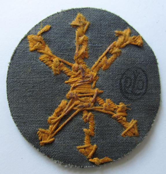 Neat, WH (Heeres) hand-embroidered, trade- ie. special career arm-patch, as intended for a: 'Funkmeister' (or radio-equipment NCO), executed on darker-green coloured wool, that is nicely maker-marked on the back - nice (ie. mint-/unissued-) condition