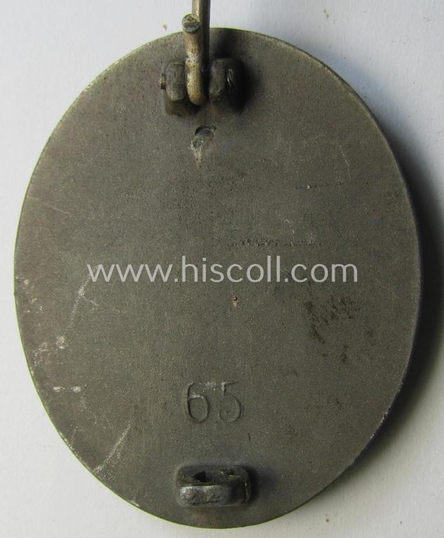 Attractive - and moderately used- and worn! - example of a maker- (ie. '65'-) marked example of a silver-class wound-badge (or: 'Verwundeten-Abzeichen in Silber') as was produced by the 'Hersteller' ie. maker: 'Klein u. Quenzer'