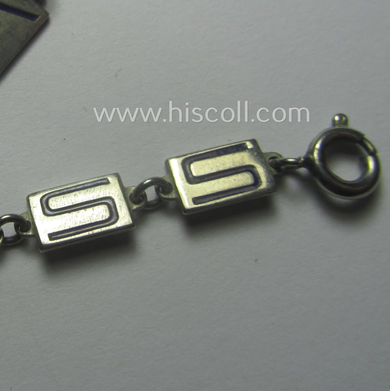 Unusual, WH (LW, Heeres, RAD etc. ie. Third Reich-) related, metal-(ie. genuine-silver?) based so-called: 'souvenir'-armband (ie. 'Kettchen') depicting the engraved text: 'Westwall Gruss'