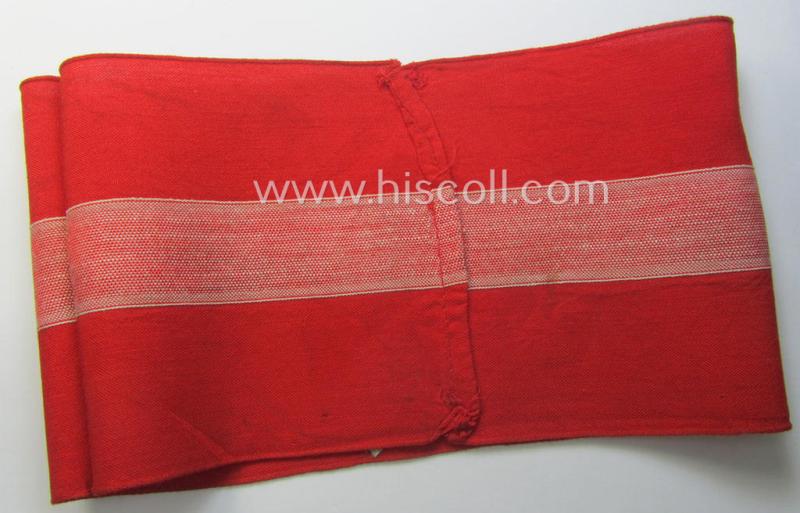 'Standard-issued'-pattern (ie. entirely woven) pattern, bright-red-coloured HJ- (ie. 'Hitlerjugend'-) related armband (ie. 'Armbinde') being a moderately worn- ie. used example that still retains its period 'RzM'-etiket