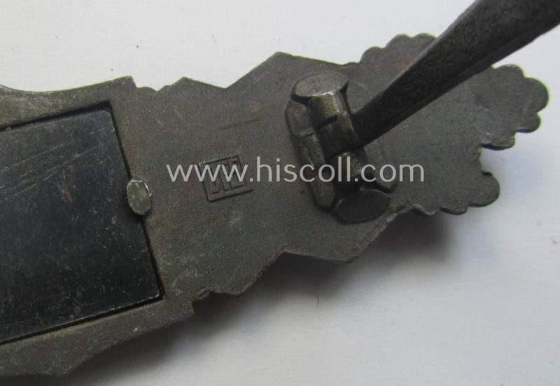 'Nahkampfspange in Bronze' (or: bronze-class close-combat clasp ie. CCC) being a neatly maker-marked- and/or minimally converse-shaped specimen as was produced by the: 'JFS'- (ie. 'Joseph Feix u. Söhne'-) company