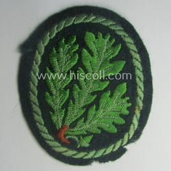 Truly used WH (Heeres) so-called: 'Jäger'-armbadge being a...