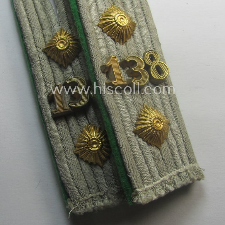 Pair of WH (Heeres) neatly 'cyphered', officers'-type shoulderboards as piped in the darker-green-coloured branchcolour as intended for usage by a: 'Hauptmann des Gebirgsjäger Rgts. 138'