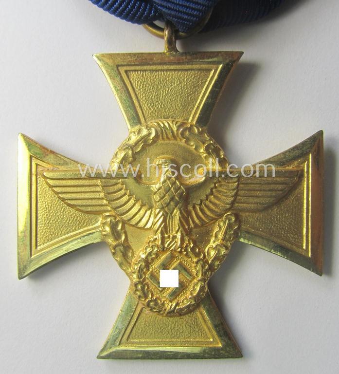 Golden-class 'Pol.-Dienstauszeichnung 1. Stufe' (or: police loyal-service medal first-class) that comes mounted onto its (typically broader-shaped!) ribbon (ie. 'Bandabschnitt')