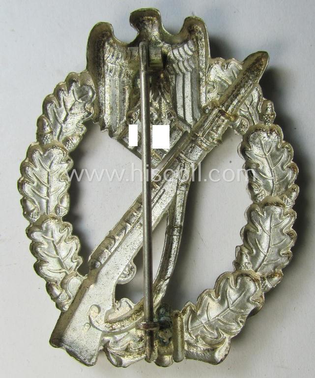 'Infanterie Sturmabzeichen in Silber' being a non-maker-marked  & 'hollow-back'-pattern example as executed in silver-toned metal (ie. 'Buntmetall' ie. Tombak) by the: 'Wilh. Deumer'-company