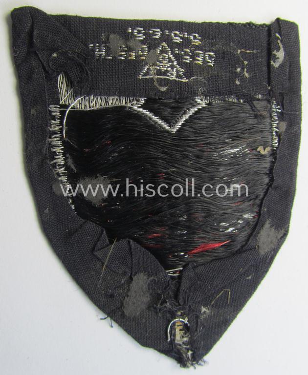 Attractive, officers'-pattern so-called: RAD (ie. 'Reichsarbeitsdienst') sleeve-badge (or: 'Dienststellenabzeichen') bearing the specialist- (ie. unit-) designation that reads: '319/2'