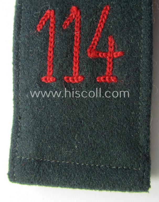 Single, WH (Heeres) EM-type 'cyphered' shoulderstrap: 'Soldat des Artillerie-Regiments 114'
