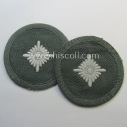 WH (Heeres) rank-insignia (ie. arm-roundel) as was specifically...