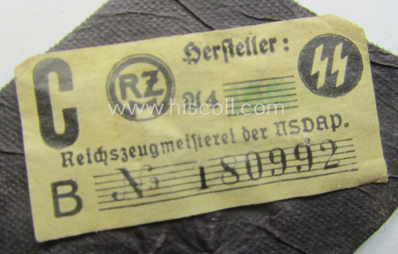 Waffen-SS, officers'-pattern, hand-embroidered sleeve-insignia (ie. 'Ärmelraute') for an: 'SS-Führer im Verwaltungsdienst' still retaining its period 'RzM'-etiket