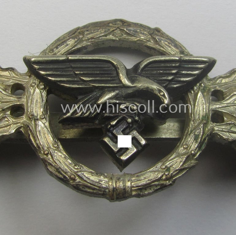 Tombak- (ie. 'Buntmetall'-) based- and/or (typical) non-maker-marked example of a WH (Luftwaffe) 'Frontflugspange für Transport- u. Luftlandeflieger in Silber' as presumably produced by the: 'C.E. Juncker'-company