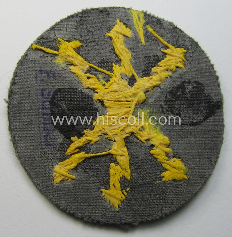 Attractive, WH (Heeres) so-called: trade- and/or special-career arm-insignia as was intended for a: 'Funkmeister' being a neatly hand-embroidered (and clearly maker-marked!) specimen on a field-grey-coloured woolen-based background