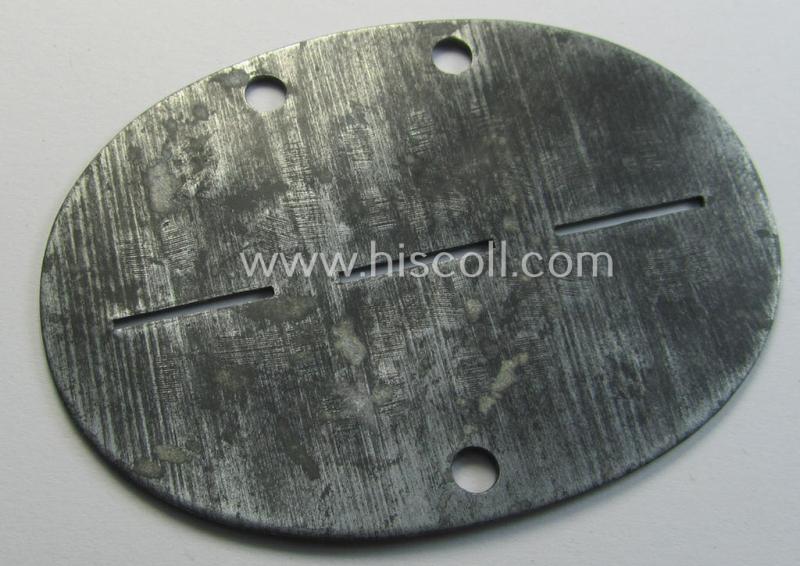 Attractive, zinc-based WH (Heeres) ie. 'Schützen'-related ID-disc (ie. 'Erkennungsmarke') bearing the clearly stamped unit-designation that reads: '1.Sch.Ers.Kp. 68' and that comes as issued- and/or worn