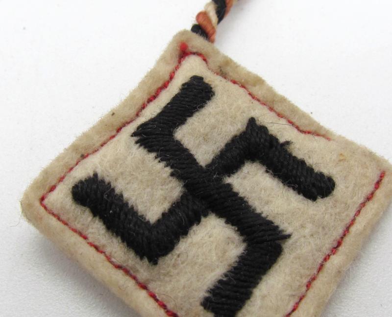 Winterhilfswerk (WHW) Donation Cord with Swastika Pendant
