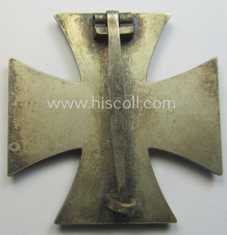 Fully untouched, 'Eisernes Kreuz 1. Kl.' (or: Iron Cross 1st class) being a typical, maker- (ie. '6.'-) marked example by the maker (ie. 'Hersteller'): 'Fritz Zimmermann' and that comes as issued and worn