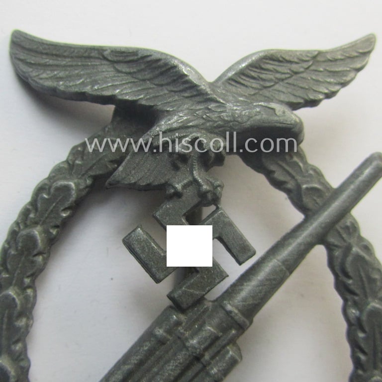 WH (Luftwaffe) 'Flakkampfabzeichen' being a very detailed albeit non-maker-marked example as was (I deem) produced by the: 'Steinhauer & Lück'-company