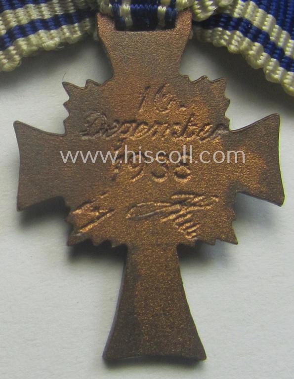 Miniature of an: 'Ehrenkreuz der deutschen Mutter - dritte Stufe' (or: bronze-class mothers'-cross) being a non-maker-marked example that comes in an overall nice- (albeit moderately worn- ie. used-), condition