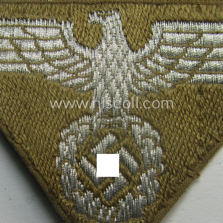 Attractive, N.S.D.A.P.-related cap-eagle as was intended for the: 'Lagermütze' (ie. side-cap) being an example as woven in bright-silver on a brownish-coloured background and as such intended for students serving within one of the: 'Ordensburgen'