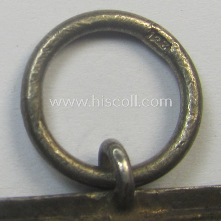 Scarcely seen, 'EK II. Klasse' being a maker- (ie. '123'-) marked example that comes with its original and once-mounted ribbon (ie. 'Bandabschnitt') as was produced by the desirable maker (ie. 'Hersteller'): 'Beck, Hassinger & Co.'