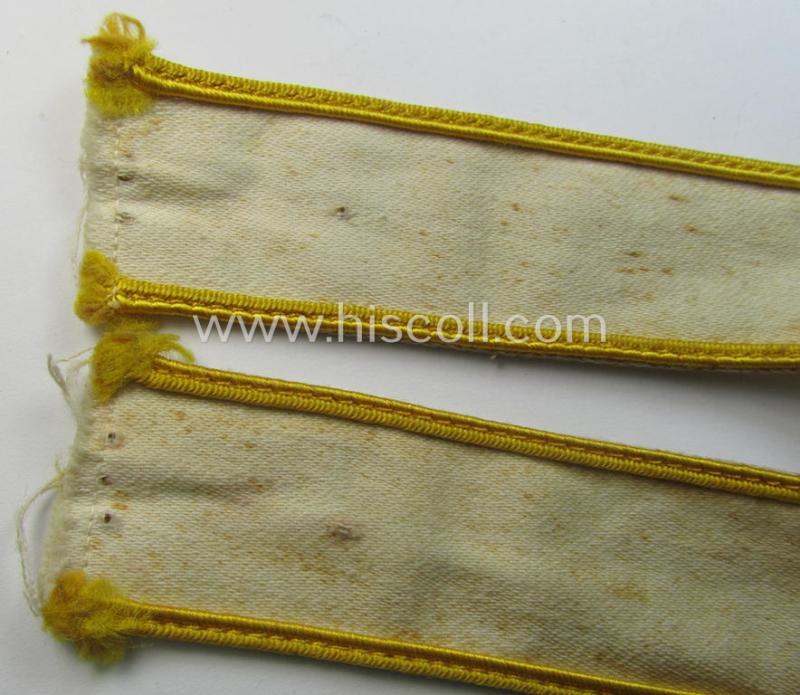 Superb, WH cuff-title (ie. 'Ärmelstreifen') entitled: 'Kreta' (being an example that bears a printed 'RbN.'-numeral) and that comes in a surely issued albeit simply never worn nor once tunic-attached, condition