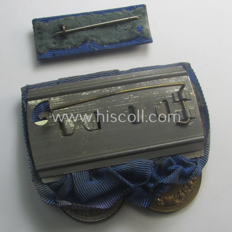 2-pieced medal-bar (ie. 'Spange') showing two: WH (Heeres o. Kriegsmarine) so-called: 'Dienstauszeichnungen für 4 u. 12 Jahre Treue Dienste' that both come period-mounted as a so-called: 'Doppelspange'