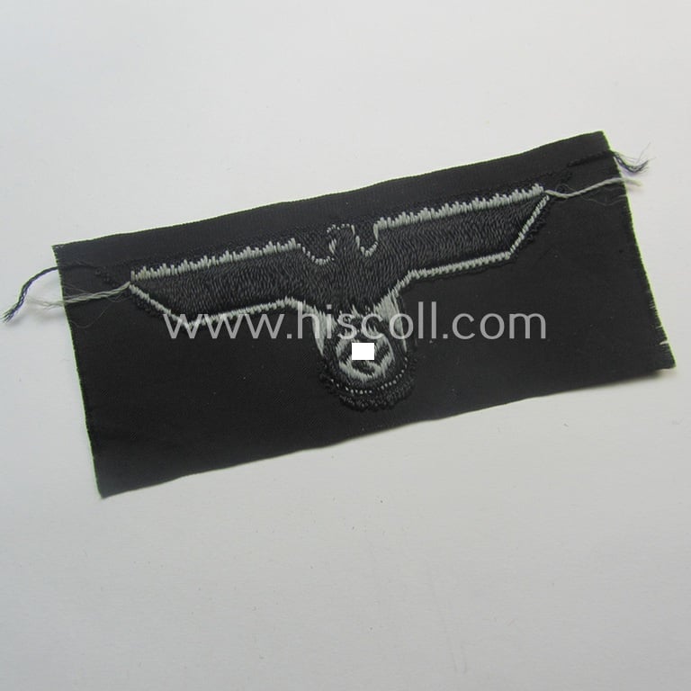 Mid-war-period, WH (Heeres) 'Panzer' cap-eagle & cocarde-set (ie. 'Schiffchenmützen-Adler u. Kokarde-Satz für Mannschaften u. Uffz.') being a 'virtually mint' set as executed in bluish-grey-coloured linnen onto a black-coloured background