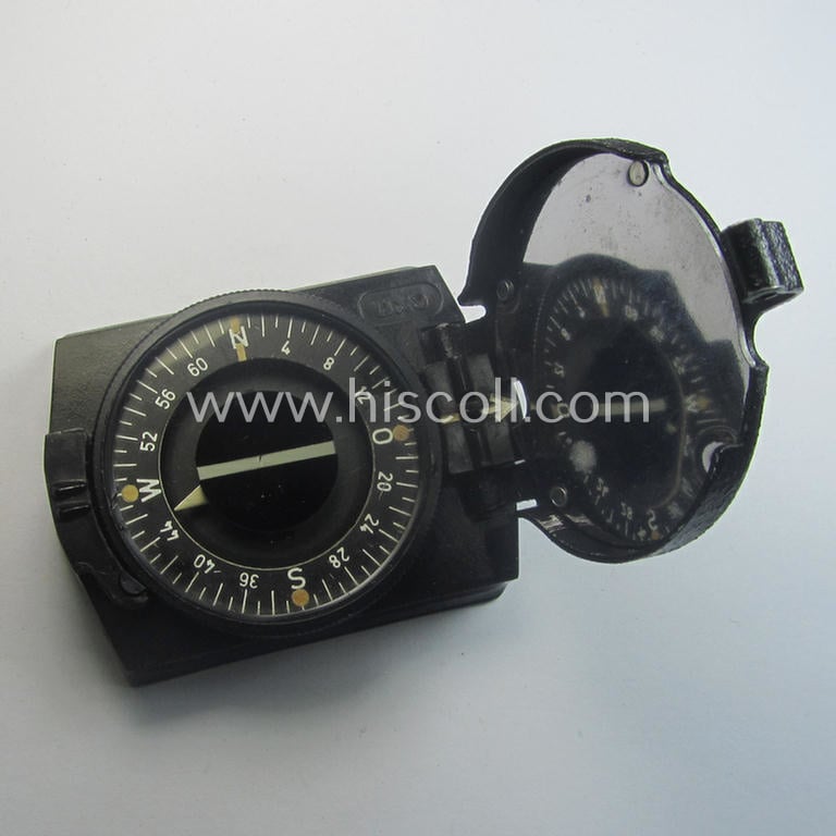 'Standard-issue'-pattern WH compass (or: 'Marschkompass') as executed in black-coloured 'Bakelite' being - I deem - a later-war-period- and/or maker- (ie. 'CXN'-) marked example